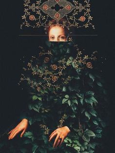 a woman is surrounded by plants and leaves with her face covered in an intricate crown