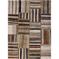 a multicolored area rug with squares and stripes on the bottom, in various colors