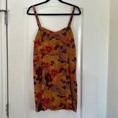 Urban Outfitters Mini Yellow Floral Dress With Orange And Purple Flowers Size Large Has Front Pockets And Side Zipper New With Tag Orange And Purple Flowers, Dresses Yellow, Orange Floral Dress, Yellow Floral Dress, Urban Outfitters Dress, Yellow Floral, Yellow Dress, Orange And Purple, Orange Yellow