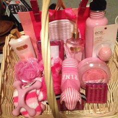 a basket filled with lots of pink items