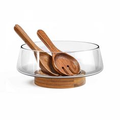 two wooden spoons in a glass bowl