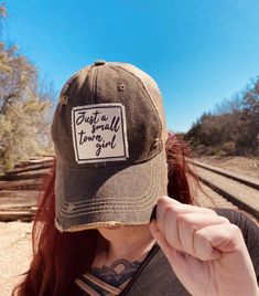 Details Vintage Distressed Trucker Cap "Just A Small Town Girl"Color: Black Distressed Material: Cotton/Polyester blend, Mesh backSize: One size fits most, with an adjustable snapback strap. Unisex cap. Just A Small Town Girl, Small Town Girl, Small Town, Trucker Cap, Small Towns, Baseball Cap, Mesh, Black, Color