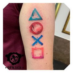 a person with a tattoo on their arm that says xoxo and two dices