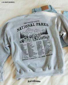 This Unisex crewneck sweatshirt features "The United States National Parks | List of the 63 National Parks | Protect & Respect the Local Wildlife" with a hand-drawn illustration of forest animals in a mountain setting on the back and front. It is the perfect gift for every animal lover passionate about preserving our beautiful and unique National Parks <3 Make sure to check out the other garment options below :) » O P T I O N S « ‣ Hoodie: https://www.etsy.com/listing/1346786720 ☆ For the altern National Parks List, National Park Shirts, Girl Camping, Camping Clothes, National Park Shirt, Clothes Vintage, Park Ranger, Camping Outfits, Hiking Shirts