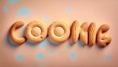 the word cookie spelled with cookies on a pink background