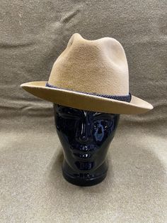 "Vintage men's Resistol brown velour brimmed fedora hat size 7. Along with a black corded band, Made in U.S.A. Excellent used condition, minor wear, check pictures.     Please, check carefully the measurements, photos and description of the article before buying it, we do not accept changes or returns. 21 1/2\" Inside band circumference  2\"   Brim  5\"   Height  We ship hats in a box, not a bag.  We take great care in packaging every item to ensure safe shipment to you.  International buyers: Please ask for the shipping rates speciality for your country." Brown Fedora With Short Brim, Brown Felt Hat With Short Brim, Adjustable Brown Fedora With Short Brim, Western Brown Fedora Panama Hat, Adjustable Brown Fedora Felt Hat, Adjustable Brown Fedora With Flat Bill, Brown Fedora Panama Hat For Rodeo, Adjustable Brown Felt Hat With Short Brim, Brown Adjustable Felt Hat With Short Brim