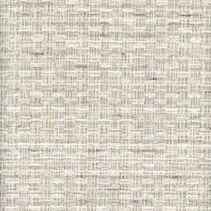 an upholstered beige and white wallpaper