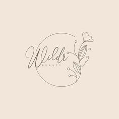 the word wild beauty written in cursive writing on a beige background with flowers