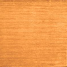 an orange colored rug with very thin lines on the top and bottom, as if it were made out of wood