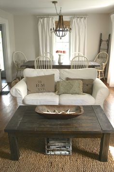 the living room is clean and ready to be used as a dining room or den