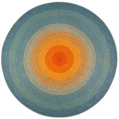 an orange and blue circular rug on a white background