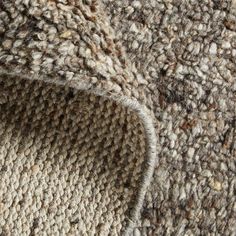 close up view of an area rug that has been made to look like carpeting