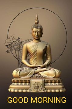 a buddha statue sitting on top of a table