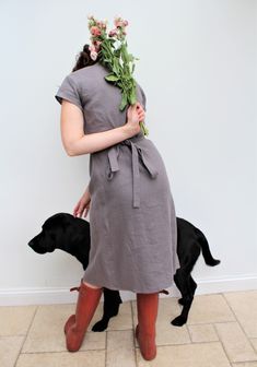 Our love of linen continues with this lovely linen wrap dress. Made in light weight Grey linen fabric, which has been prewashed giving a soft feel. With its flattering sleeves and the all essential Voy side pocket. This will quickly become one of your go-to dresses, and will find it really useful both for work and play! A capsule wardrobe must for the coming season! Length is below knee to mid-calf. Handmade in our studio to order Easy care as you can hand/machine wash. Linen used is Oeko Tex ce Linen Wrap Dress, Gray Linen, Dresses Uk, Side Pocket, Find It, Mid Calf, Capsule Wardrobe, Linen Fabric, Our Love