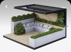 an outdoor living area with couches and plants