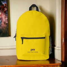 A vibrant personalized backpack with simple minimalist styling, this design in trendy mustard yellow with black lettering has a text template to personalize with your monogram initials and name. It's a great choice for an active lifestyle and people who are on the go. Use it for work, school, sports, travel and more to carry your essentials with you in style. Casual Personalized Standard Backpack, Casual Personalized Travel Backpack, Casual Personalized Backpack, Casual Personalized Backpack For Everyday, Casual Personalized Backpack For Everyday Use, Personalized Casual Backpack For Everyday Use, Text Template, Personalized Backpack, Sports Travel