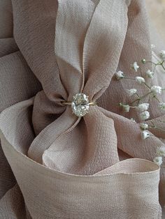 a close up view of some fabric and flowers