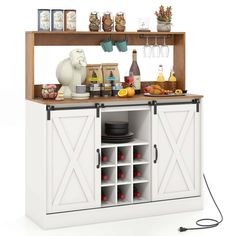 a white cabinet with wine glasses and bottles on the top, next to an open shelf