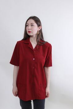 Hi! This is vintage from 90s orange color button up minimalist heavy blouse. This top made of synthetic material - PE 100%. The model in the photo is 170 cm tall and is wearing a LARGE size shirt.But, be careful, this is a vintage size, it is better to check the measurements below in the product description. Sleeve - 40cm / 15.74inch; Width - 58cm / 22.83inch; Length - 80cm / 31.49inch. All measurements are taken seam to seam while lying flat. Sleeve measurement made from armpit to end of sleeve Formal Short Sleeve Tops With Pockets, Formal Short Sleeve Shirt With Pockets, Red Short Sleeve Blouse For Work, Vintage Solid Color Short Sleeve Shirt, Classic Short Sleeve Solid Color Blouse, Classic Short Sleeve Blouse, Retro Short Sleeve Office Top, Formal Shirt With Pockets And Short Sleeves, Formal Short Sleeve Shirt With Button Closure