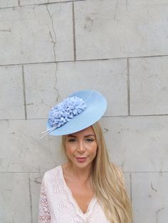 This hat is perfect for special occasions. Featuring disc detailing with blue/grey flowers, grey quills and light blue base. This comes on a headband to hold into place. It can also have a comb added for extra security.  . Many more items like this are available in our shop! Light Blue Headpieces For Spring Wedding, Adjustable Light Blue Fascinator For Royal Ascot, Blue Brimmed Fascinator For Spring, Brimmed Blue Fascinator For Spring, Light Blue Hat For Royal Ascot Races, Adjustable Light Blue Fascinator For Spring, Light Grey Blue, Fascinator Wedding, Hat Fascinator