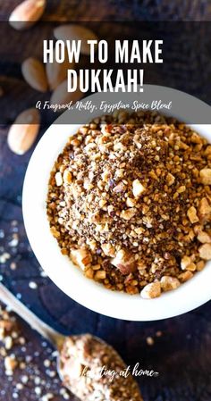 a white bowl filled with nuts on top of a table