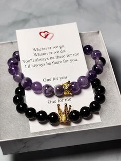 "Matching set of gemstone bracelets for couples, friends, or family Remind yourself of the special relationships you have with those that you adore with these couples/distance bracelets. Each set comes in a complimentary gift box with a note that reads: \"Wherever we go, Whatever we do, You'll always be there for me I'll always be there for you. One for you One for me\" Bracelets are made with 8mm AAA grade quality stone beads and include a magnetic bead to attach to one another  Gold plated King and queen crowns Available in several sizes.  Measure your wrist by wrapping a fabric tape measure around.  The number of inches is the size you want to order Every bracelet is personally hand made by me.  Nothing factory mass produced Find more selections in my shop: essentialjewels2022.etsy.com Black Promise Bracelets For Valentine's Day, Valentine's Day Gift Bracelets With Natural Stones, Couples' Black Promise Bracelets, Couples Beaded Bracelets For Valentine's Day, Couples Black Bracelets For Best Friend Gift, Black Couples Bracelets For Best Friend Gift, Black Bracelet Jewelry For Best Friend Gift, Valentine's Day Black Beaded Bracelet For Best Friend, Black Bracelet Jewelry For Birthday Gift