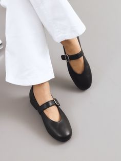 Editor's NotesTWVP presents handmade feminine shoes with high-quality materials and modern mood.- Mary-Jane shoes- Adjustable flat strap with buckle detail- Modern slim round toe - Easy slip-on design - Non-slip outsole detail Measurements(in.)- Size: KR 225MM (US 5.5) - KR 255MM (US 8.5)- Heel Height: 0.4 in.*Fits true to the sizeComposition & Care- Lambskin/ Lining: Synthetic Leather- Insole: Synthetic Leather- Avoid direct heat and moisture- Professional leather care is rec Leather Mary Jane Ballet Flats With Buckle, Mary Jane Ballet Flats With Buckle Closure, Mary Janes With Removable Insole And Flat Heel, Mary Jane Flats With Heel Strap And Almond Toe, Chic Closed Toe Mary Janes With Buckle, Chic Closed Toe Mary Janes With Buckle Closure, Leather Ballet Flats With Round Toe, Medium Width Low Heel Mary Janes With Buckle, Mary Jane Flats With Medium Width