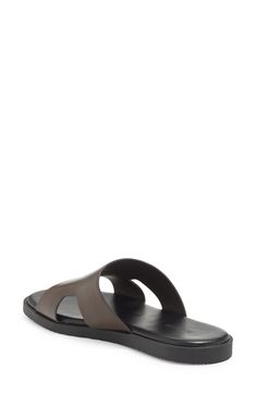 A cutout vamp adds a breezy feel to this vacation-ready slide sandal fashioned with a cushioned footbed. Synthetic upper, lining and sole Imported Brown Open Toe Sport Sandals For Vacation, Classic Slip-on Slides For Summer, Classic Footbed Sandals For Summer Vacation, Classic Summer Footbed Sandals For Vacation, Classic Flat Sandals For Vacation, Summer Travel Slip-on Sandals, Brown Slip-on Sport Sandals For Vacation, Classic Slide Sandals For Vacation, Classic Slide Footbed Sandals For Beach