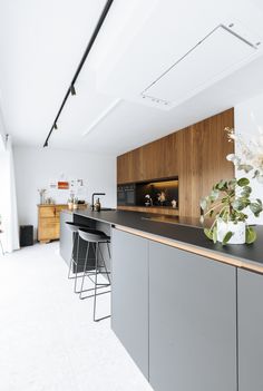 the kitchen is clean and ready to be used as a dining room or office space