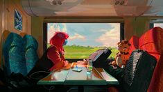 two people sitting at a table in front of a window on a train with stuffed animals