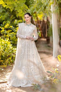 Brand: AZZAL by Ayesha & UsmanProduct: D-06 SafedCollection: AZZAL by Ayesha & Usman Noor Wedding Formals Unstitched CollectionFabric: Net PRODUCT DETAILS: Embroidered front kali with hand Embellishment (NET)6 Pcs Embroidered Back kali 6 Pcs (NET) Embroidered Front body with Embellishment 1 Pcs (NET) Embroidered Back body with 1 Pcs (NET) Embroidered Front Border With Embellishment 1.75 Yards (NET) Embroidered Back Boreder 1.75 Yards (NET) Embroidered Sleeve with Embellishment 0.67 Yards(NET) Em Semi-stitched Dabka Work Wedding Gown, White Dabka Gown For Reception, Wedding Gown With Dabka Work For Eid, Wedding Gown With Resham Embroidery For Eid, Eid Wedding Gown With Resham Embroidery, Party Wear Gown With Resham Embroidery For Wedding, Resham Embroidery Gown For Wedding Party, Wedding Gown With Resham Embroidery, Resham Embroidery Wedding Gown