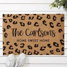 a door mat with the words, the carisons home sweet home on it