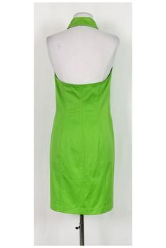 This stunning halter neck dress is perfect for the warm weather. Style it with gold-tone sandals and a chic clutch for a classy day time look. Size 8 - GER 38 96% cotton, 4% elastane Halter neckline Collar Buttons along front Front lace-up pockets Fitted Light discoloration on underarms Small light stain on back of collar Tiny stain on front of dress Bust 33" Waist 31" Shoulder to hem 37.25" Summer Halter Neck Formal Dresses, Summer Formal Halter Neck Dress, Chic Fitted Halter Dress For Summer, Spring Formal Halter Neck Dress, Halter Neck Dresses For Formal Summer Events, Summer Formal Halter Neck Midi Dress, Summer Formal Midi Dress With Halter Neck, Formal Halter Neck Midi Dress For Summer, Stretch Cotton Summer Midi Dress