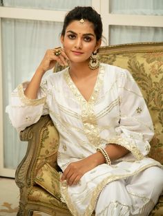 Noor Swetambari White Gota Work Kurta Set (Set of 2) By Maison Shefali now available at Trendroots Off-white Straight Kurta Palazzo Set For Festivals, Off White Kurta With Gota Work For Eid, Off White Gota Work Sets For Diwali, Off White Sets With Gota Work For Diwali, Diwali Cream Palazzo Set With Straight Kurta, Festive Off White Straight Kurta, Elegant Off White Salwar Kameez For Navratri, Off White Straight Kurta Set For Navratri, Festive Off White Kurta With Mirror Work