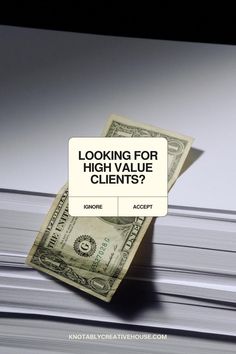 a stack of money with the words looking for high value client? on top of it