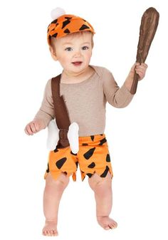 a baby dressed in a costume holding a baseball bat and wearing a hat with ears