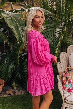 - Live your best beach life with this flowy dress! - Lightweight material with a built-in partial lining - A ruffled v-cut neckline with a tie detail - Gathered ruffles at the yoke - Long, loose sleeves with smocked cuffs - A relaxed silhouette that ends in a mini dress length hemline Loose Sleeves, V Cut, Flowy Dress, V Cuts, The Coast, In Hot, Beach Life, Live For Yourself, Shift Dress