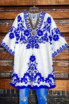 Boho-Chic Cover up Tunic Dress 30% Cotton 70% Polyester Machine or Hand Wash Cold Water Semi Sheer peasant gauzy Length 33/34" Loose Fitting Imported Measurement Approx.; Length: 33/34" Bust: 48/50" Bohemian V-neck Tunic With Floral Print, Blue V-neck Tunic For Spring, Spring Beach Tunic With Split Neck, Spring Bohemian Tunic For Vacation, Bohemian Spring Vacation Tunic, Spring Beach Tunic With Floral Embroidery, Summer Boho Print Tunic With V-neck, Embroidered Tunic For Beach Cover-up In Spring, Spring Embroidered Tunic As Beach Cover-up