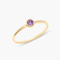 Introducing the Eden Vermeil Birthstone Ring! This one-of-a-kind ring features a custom gold band with a stunning birthstone for a truly unique and personal touch. Perfect for adding a little sparkle and personality to any outfit. Available in 14k gold vermeil Band width: 1mm 3mm cubic zirconia stone NOTE ﻿- Birthstone color may slightly vary per the color chart. SKU: BYR1132 Adjustable Round Band Gemstone Birthstone Ring, 14k Gold Stackable Rings With Center Stone As Gift, Gold Dainty Birthstone Ring With Center Stone, Yellow Gold Birthstone Crystal Open Ring, Everyday Crystal Ring With Birthstone, Dainty Gold Birthstone Ring With Center Stone, Stackable Amethyst Ring With Round Band For Promise, Stackable Amethyst Promise Ring With Round Band, Yellow Gold Stackable Rings With Center Stone As Gift