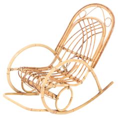 a wooden rocking chair made out of bamboo