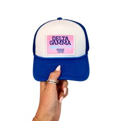 Trendy two-toned trucker hat with Officially Licensed Collegiate Design Sorority Patch Collegiate Trucker Hat With Embroidered Logo, Sorority Merch Hats, Team-colored Collegiate Hats For Game Day, Sorority Hats, Trucker Hat Sorority, Collegiate Design, Alpha Gamma Delta, Delta Gamma, Sigma Kappa