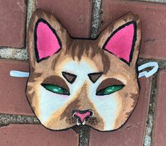 Looking for the perfect cat mask to complete your Therian or quadrobics look? Look no further than our handmade cat mask! Perfect for quadrobics, cosplay, anime, and Halloween costumes. Each mask is 100% handmade with high-quality felt, paint, fur, and foam. It takes 4 hours to create each mask, ensuring attention to detail and durability. With a one-size-fits-most design, this mask is sure to be a hit with therians and quadrobists of all ages. Orange And White Cat, Masks Crafts