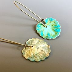 "Small Patina Leaf Earrings - Gorgeous Verdigris Leaves with Long Antiqued Brass Earwires. The fourth picture shows the back. It is not patina'd. Leaves are slightly 20mm (.75\") in diameter Earrings measure 1.75\" from top of earwire to bottom of leaf This is a stock photo. Patina varies slightly. Larger version of these earrings: https://www.etsy.com/listing/646432235/leaf-earrings-patina-jewelry-leaf?ref=shop_home_active_1&frs=1 Be sure to check out my Verdigris Collection for similar ite Unique Nickel-free Leaf-shaped Earrings, Green Brass Earrings Nature-inspired, Turquoise Nature-inspired Drop Earrings, Turquoise Dangle Earrings With Patina, Turquoise Patina Dangle Earrings, Nature-inspired Turquoise Dangle Earrings, Green Hypoallergenic Brass Earrings, Hypoallergenic Green Brass Earrings, Patina Drop Earrings As Gift