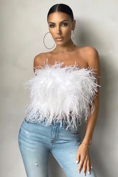 Ooze glamour and style with BARBARA Feather Crop Top. For a look that's beyond extra, this eye-catching full feather top is a sure-fire way to ensure all eyes on you as you step out to meet the girls at the bar or a romantic night with bae. Worked in our luxurious feathers this statement bandeau crop top works just as well with jeans as it does styled under a blazer and trouser combo for fashion week glam. Fabric | Real Ostrich Feathers Lining | Silk Polyester Elegant Crop Top, Feather Crop Top, Feather Top, Club L London, Feather Tops, Bandeau Crop Top, White Feathers, Spring Tops, White Crop Top