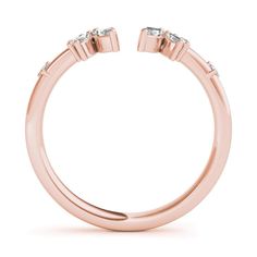 a rose gold ring with three diamonds on top