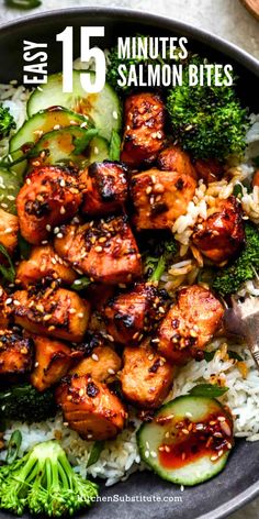 a bowl filled with chicken and rice covered in sesame seeds, broccoli and cucumbers