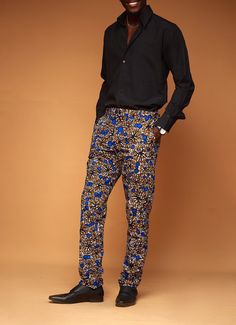 Zanaani's classic trousers are designed from durable cotton or poly-cotton in a slimfit silhouette. Crafted in African print they're detailed with abstract prints, side pockets and belt loops. Achieve a more casual look by teaming with white sneakers or a professional look by pairing with your favorite white shirt or blazer jacket. PRODUCT DETAILS -Button and concealed zip fastening at front -Composition:Poly-cotton -Dry clean or machine wash with like colors -Slimfit Fit  -Belt Loop -Fixed waistband -Side pocket SIZE GUIDE Size :      M                      L                   XL                    2XL                       3XL                                                                                   Waist:     35                    38                 41                     44 Ankara Kimono Jacket, Ankara Kimono, African Gifts, Classic Trousers, African Men, Kimono Jacket, White Sneakers, Look Plus, African Clothing