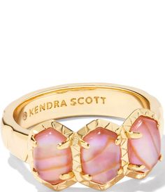 From Kendra Scott&#x2C; this ring features:Band ringPlated brass/stoneApprox. 0.18" W bandImported. Kendra Scott Jack Band Ring, Kendra Scott Opal Ring, Kendra Scott Jewelry Rings, Preppy Rings, Unique Gold Rings, Preppy Jewelry, Pink Iridescent, Dope Jewelry, Gold Band Ring