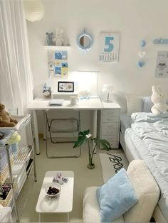 a bedroom with a bed and desk in it