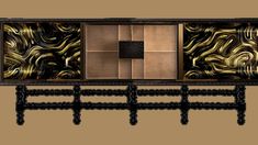 an artisticly designed cabinet is shown in gold and black